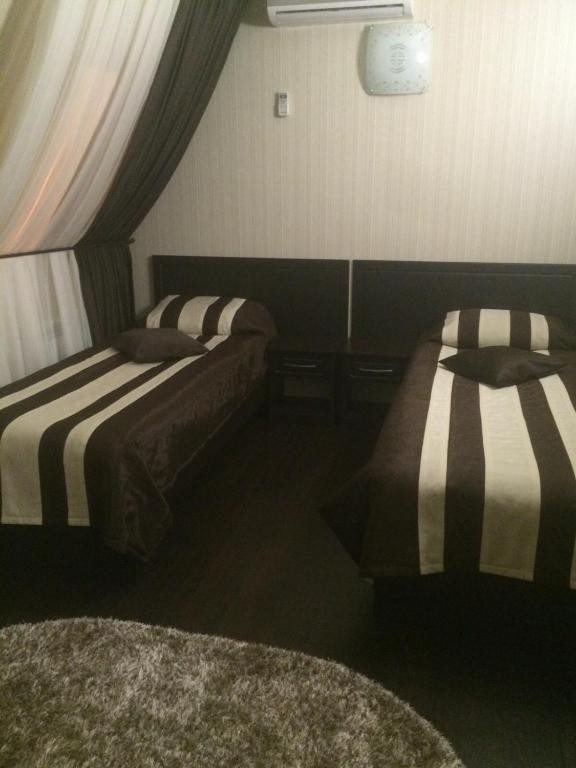 Двухместный (Двухместный номер с 2 отдельными кроватями и ванной комнатой) гостевого дома на Академика Трибулина, Краснодар