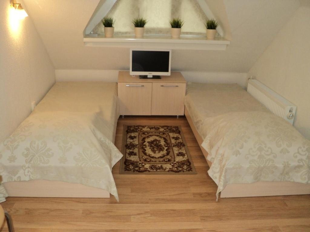 Двухместный (Двухместный номер с 2 отдельными кроватями и собственной ванной комнатой) гостевого дома Валентино, Краснодар