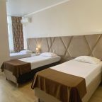 Трехместный (Улучшенный стандарт ( три раздельные кровати)), Отель Лабиринт