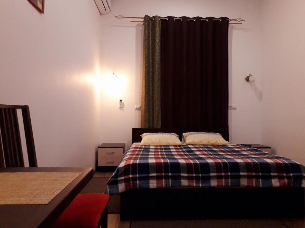 Двухместный (Двухместный номер с 1 кроватью или 2 отдельными кроватями и ванной комнатой) мини-гостиницы Mini Hotel Time, Краснодар