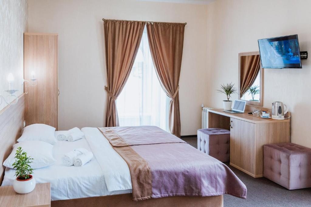 Двухместный (Двухместный номер Делюкс с 1 кроватью или 2 отдельными кроватями) мини-отеля SedINN Hotel, Краснодар