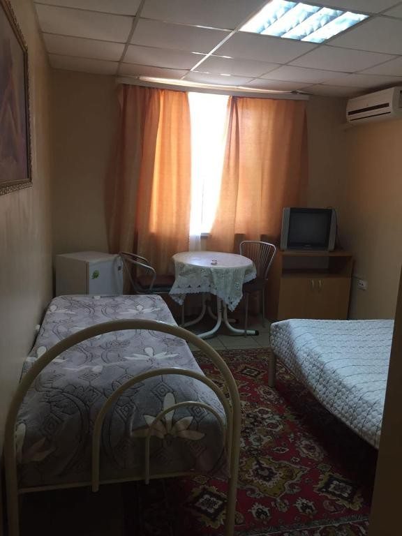 Двухместный (Небольшой двухместный номер с 2 отдельными кроватями) гостевого дома Арена, Краснодар