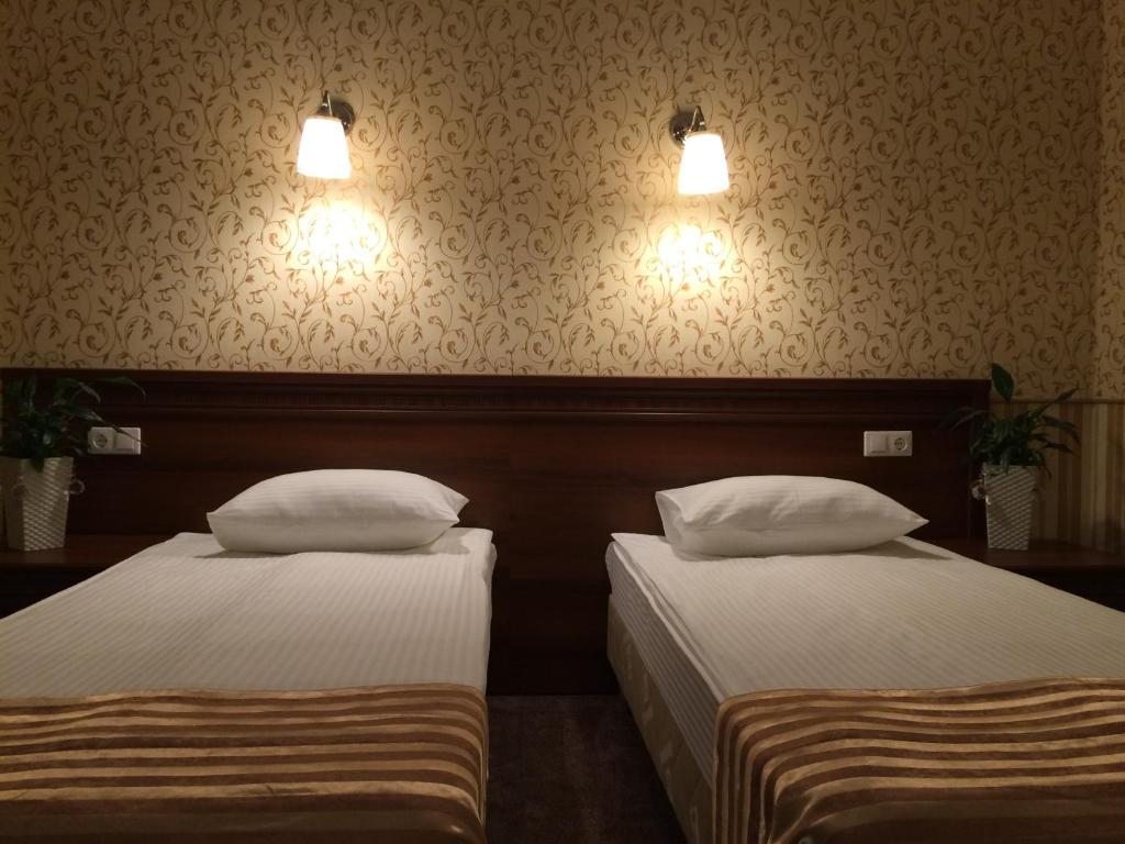 Двухместный (Двухместный номер с 1 кроватью или 2 отдельными кроватями и собственной ванной комнатой) отеля Гермес, Краснодар