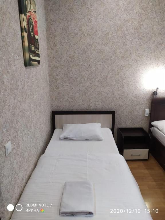 Двухместный (Двухместный номер с 2 отдельными кроватями и общей ванной комнатой) мини-отеля Ладомир на Зельевом, Москва