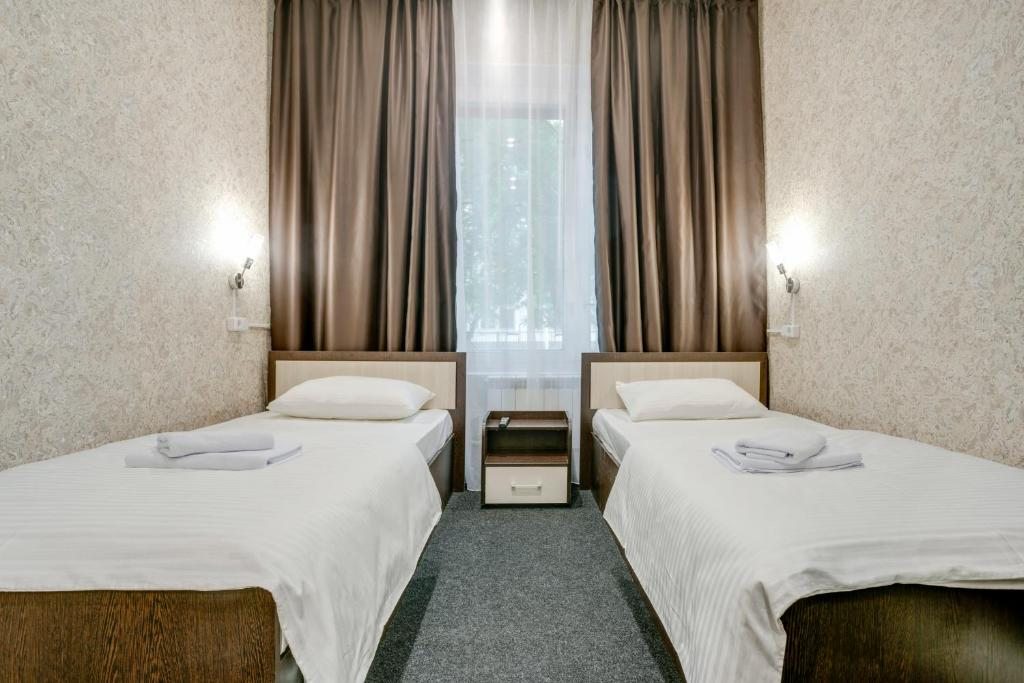 Двухместный (Двухместный номер с 2 отдельными кроватями) мини-отеля Ладомир на Зельевом, Москва