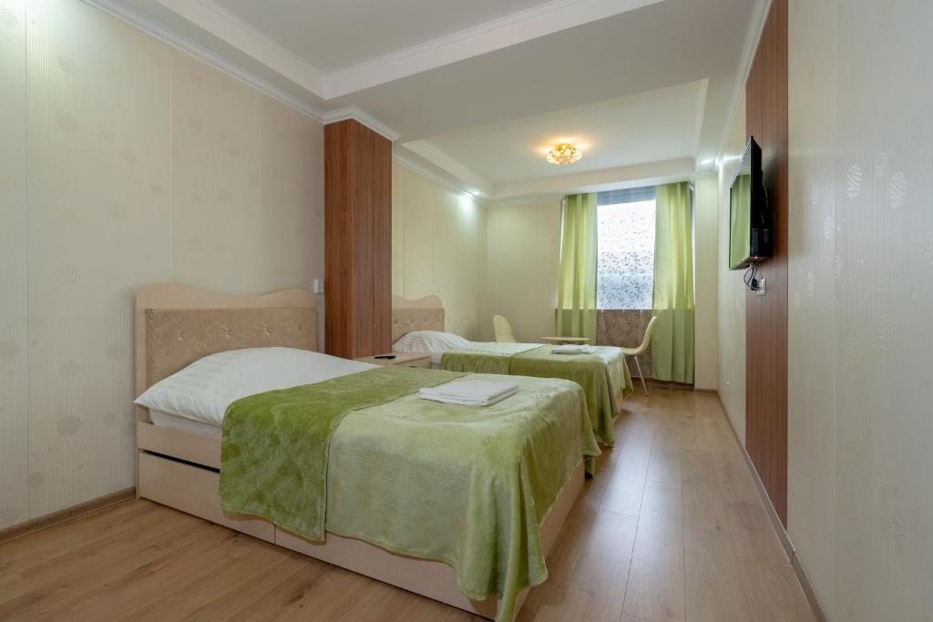 Двухместный (Двухместный номер Делюкс с 2 отдельными кроватями) отеля Мишка, Санкт-Петербург