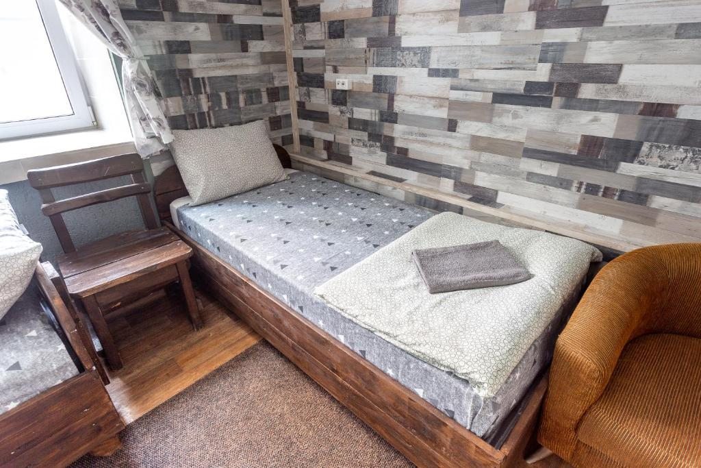 Трехместный (Трехместный номер с основными удобствами и общей ванной комнатой) отеля Грелка, Омск