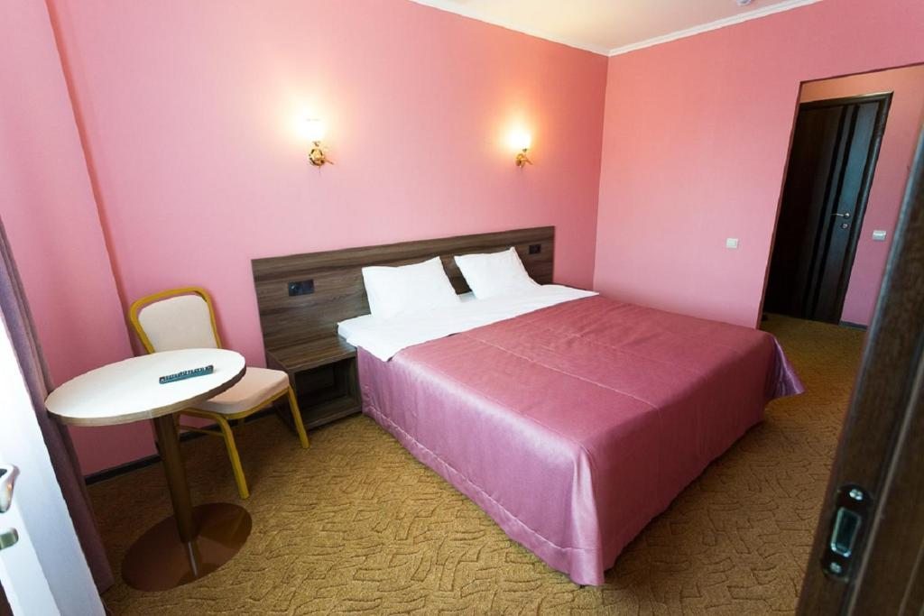 Двухместный (Двухместный номер с 2 двуспальными кроватями) отеля Экопарк в Раздолье, Омск