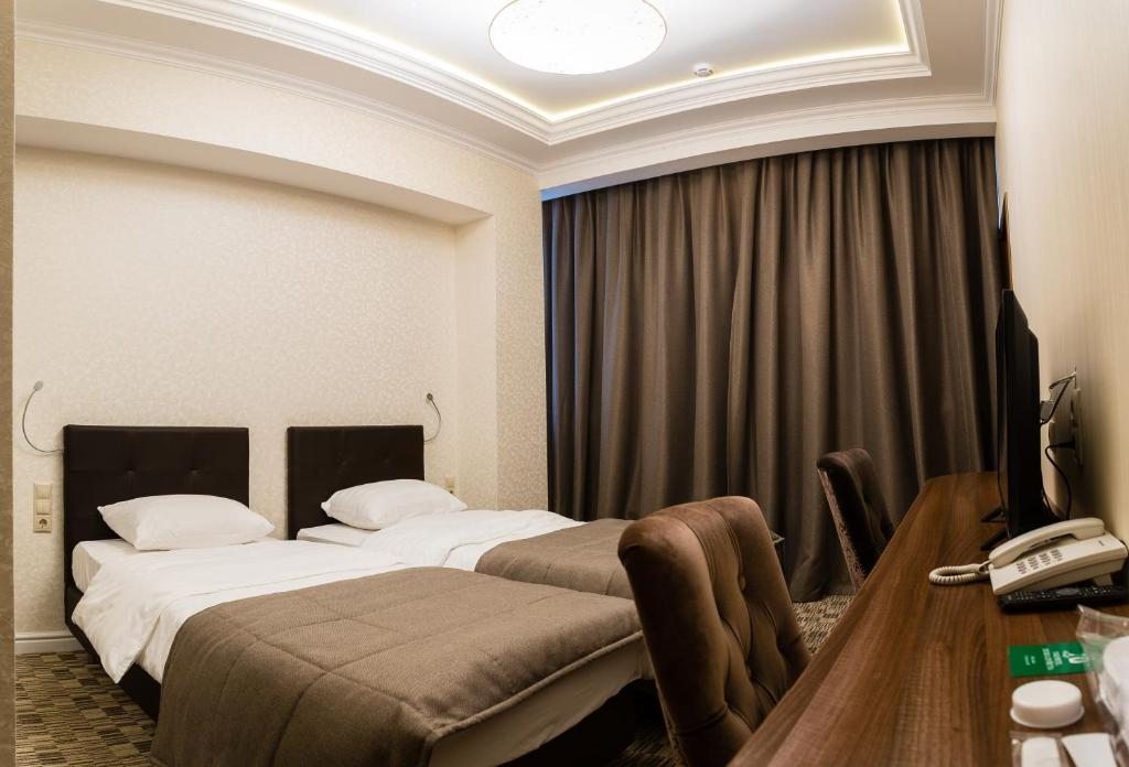 Двухместный (Двухместный номер с 2 отдельными кроватями) отеля Вишнёвый Сад, Москва