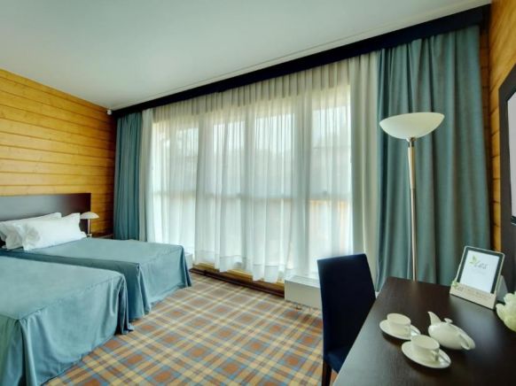 Фотография номера гостиницы Лес Арт Резорт