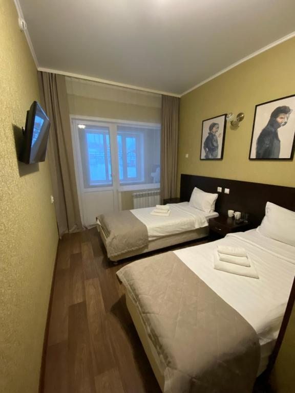 Двухместный (Стандартный двухместный номер с 2 отдельными кроватями) отеля Северная Пальмира, Алексеевка (Белгородская область)