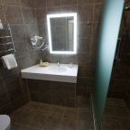 Ванная комната в гостинице Планета Iq, Фрязино