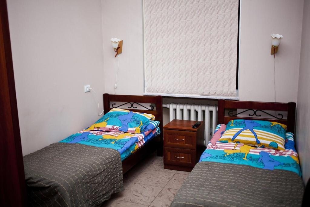 Двухместный (Улучшенный двухместный номер с 2 отдельными кроватями) отеля Regard, Санкт-Петербург