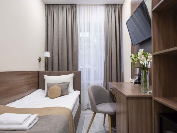 Фотография номера гостиницы Голд Инн Академия