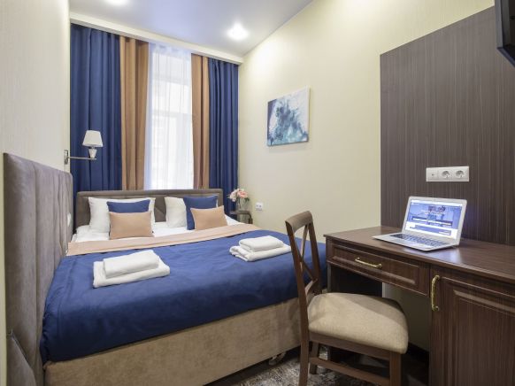 Фотография номера гостиницы Голд Инн Академия