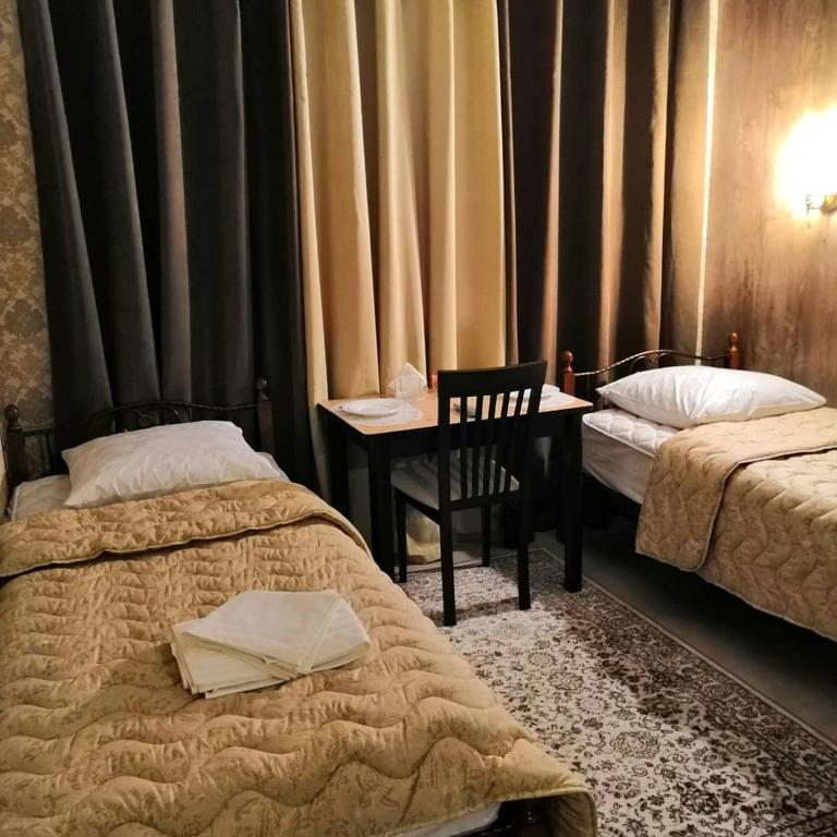 Двухместный (Просторный двухместный номер с 2 отдельными кроватями) отеля Милан, Люберцы