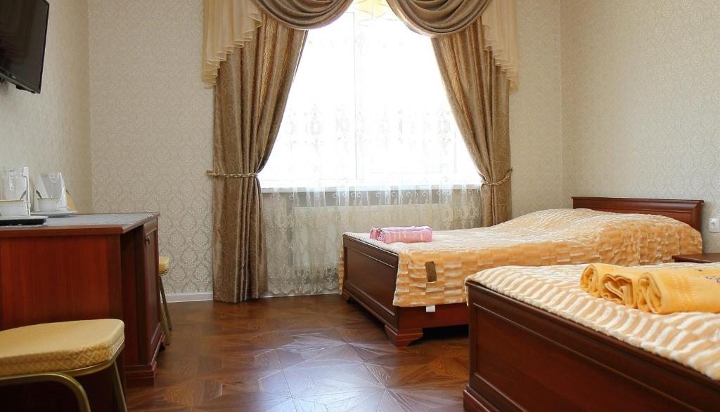 Двухместный (Большой двухместный номер с 2 отдельными кроватями) отеля Классик, Балашиха