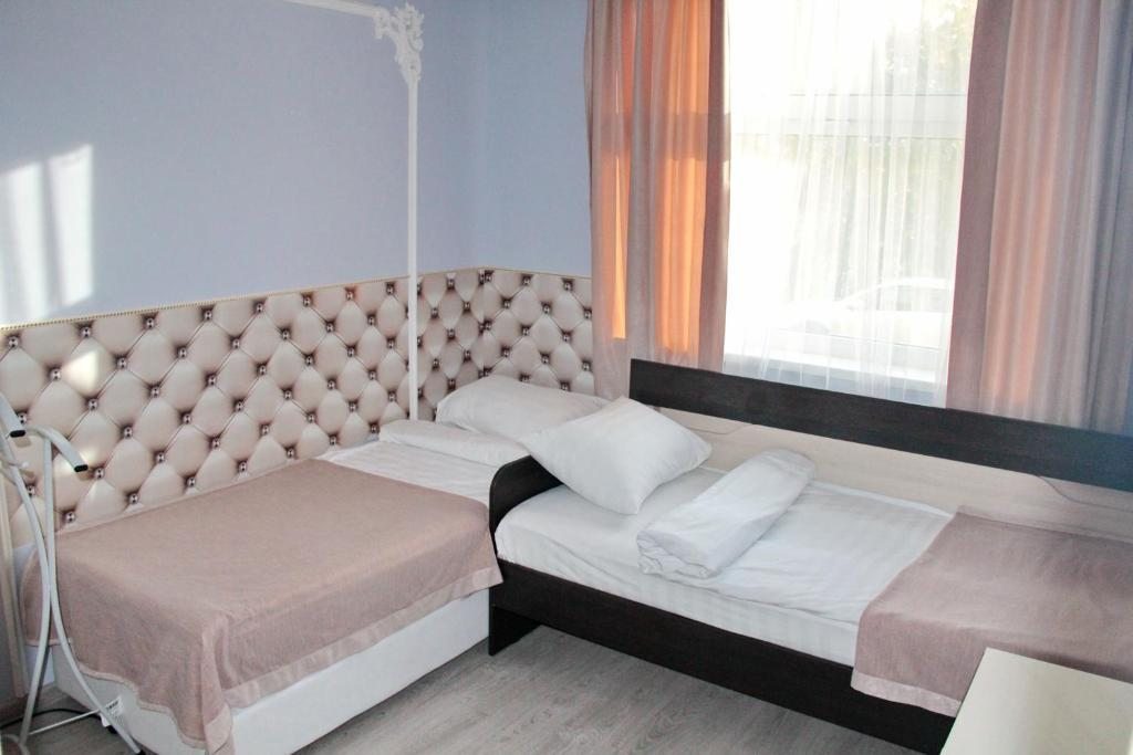 Двухместный (Бюджетный двухместный номер с 2 отдельными кроватями) гостевого дома АБ, Москва