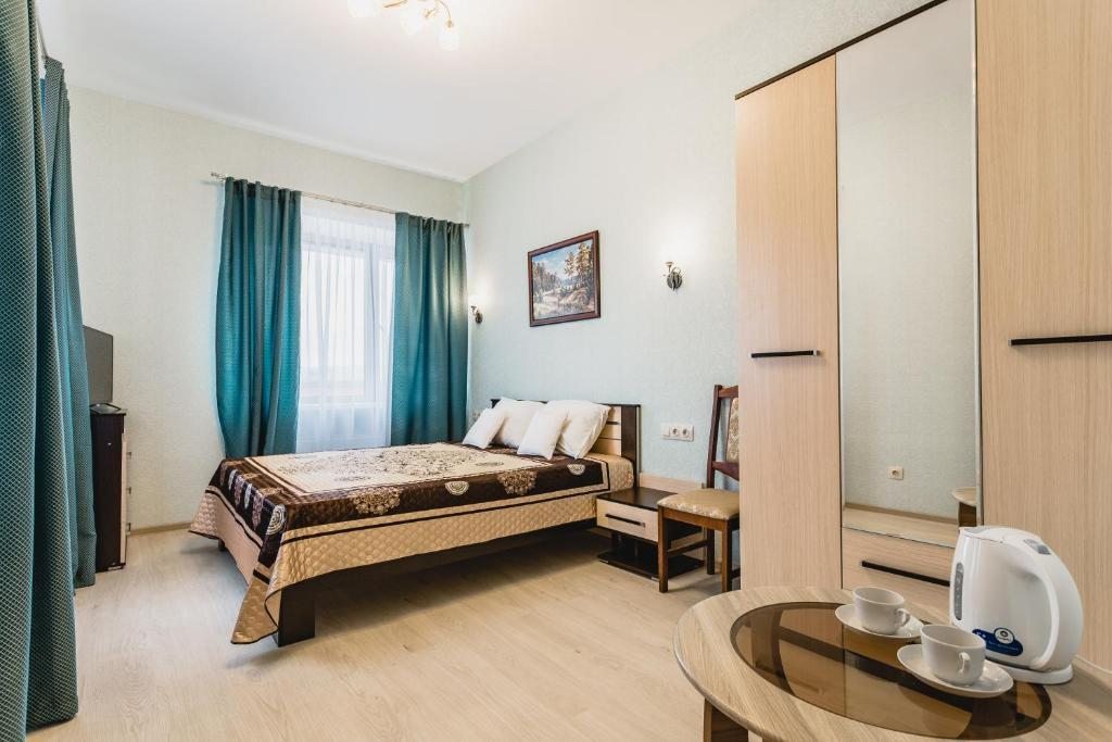 Двухместный (Двухместный номер с 1 кроватью и общей ванной комнатой) отеля Марли, Петергоф