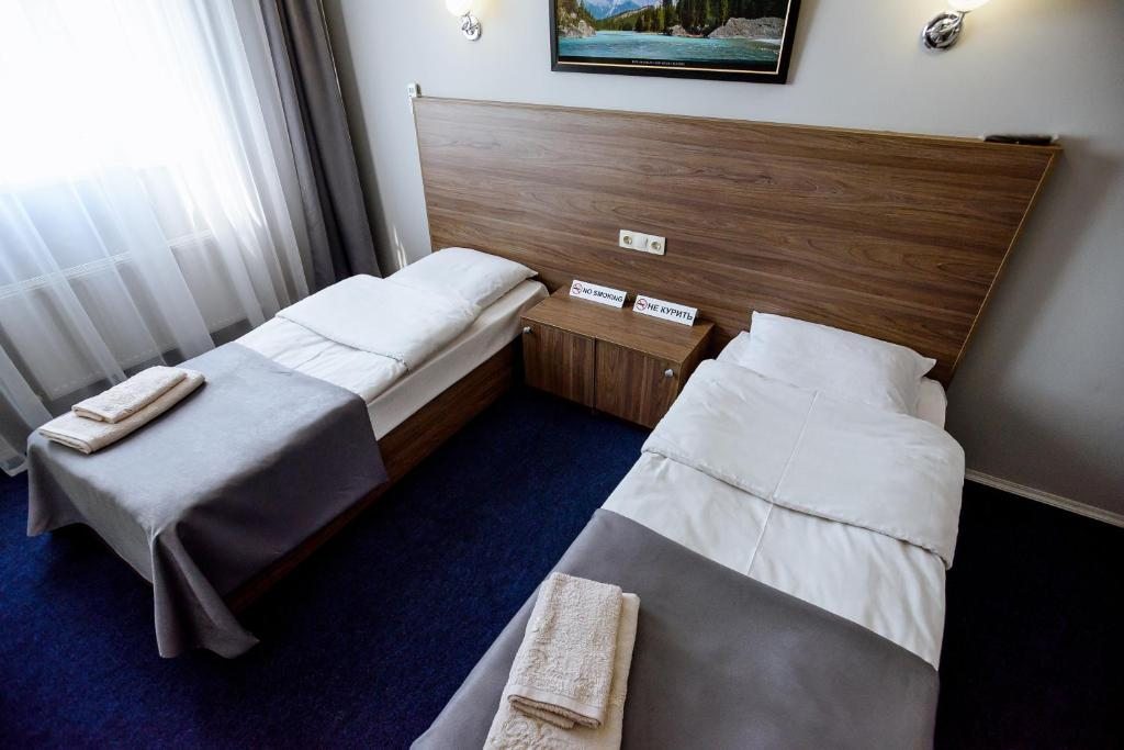 Двухместный (Большой двухместный номер с 2 отдельными кроватями) гостиницы Астрафуд, Астрахань