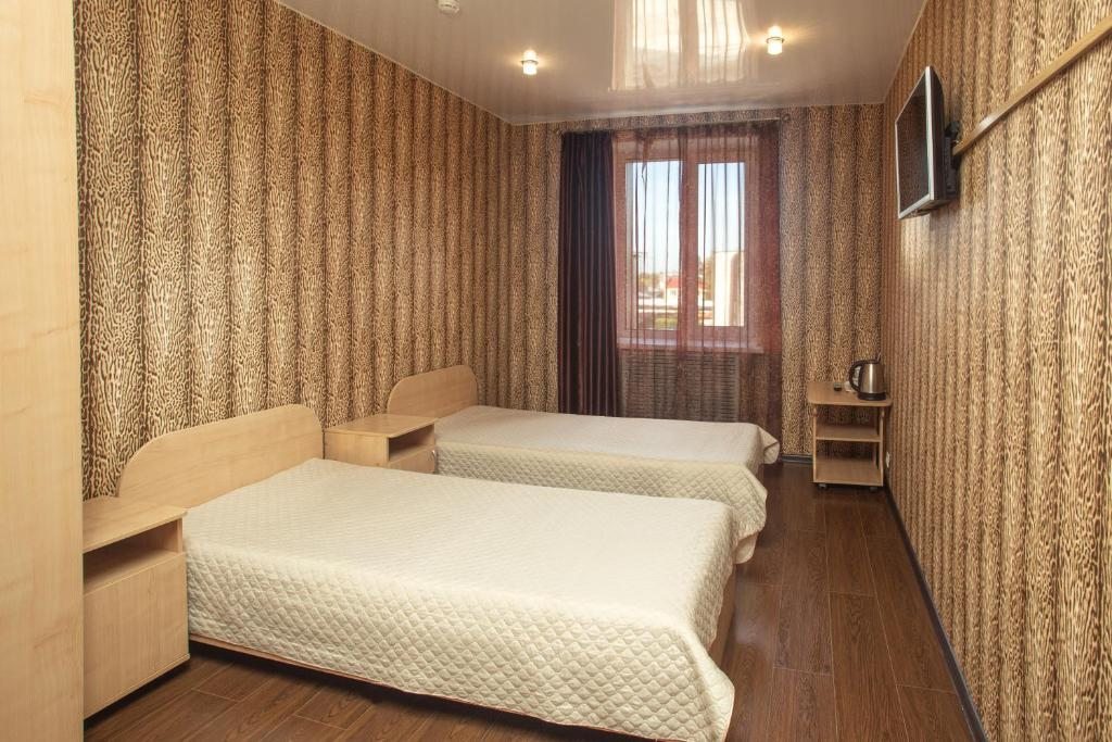 Двухместный (Бюджетный номер с 2 отдельными кроватями) гостиницы Изумруд, Кемерово