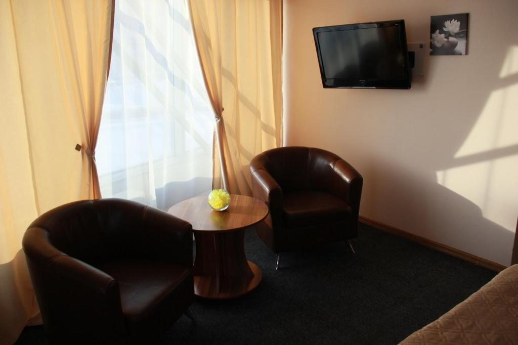 Двухместный (Стандартный двухместный номер с 2 отдельными кроватями) отеля СпортОтель, Кемерово