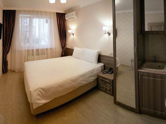 Фотография номера гостиницы Отдохни