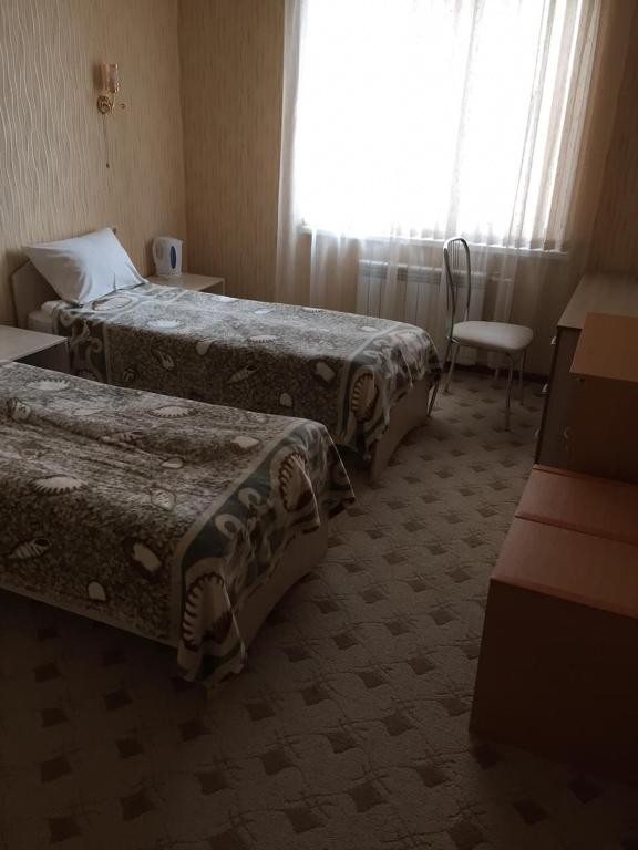 Двухместный (Двухместный номер с 2 отдельными кроватями и собственной ванной комнатой) отеля Формула 1, Волгоград