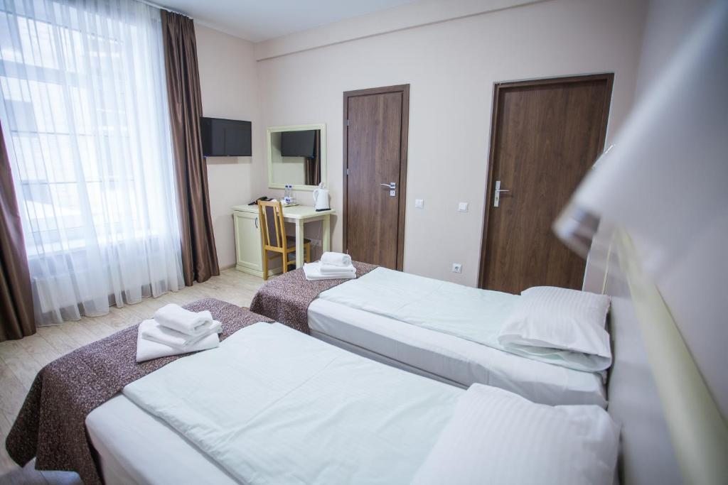 Двухместный (Небольшой двухместный номер с 1 кроватью или 2 отдельными кроватями) отеля Золотая Миля, Зеленоградск