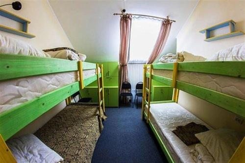 Номер (Кровать в общем номере с 4 кроватями) хостела Мегахостел, Оренбург