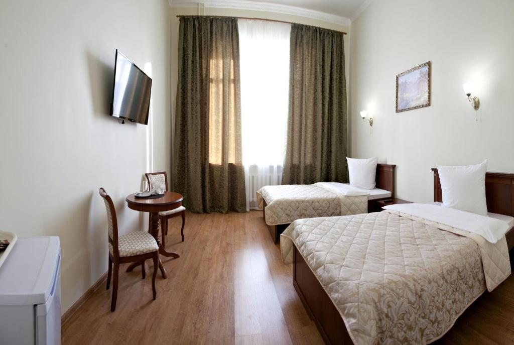 Двухместный (Большой двухместный номер с 2 отдельными кроватями 1,2*2,0) гостиницы Никольская, Тюмень