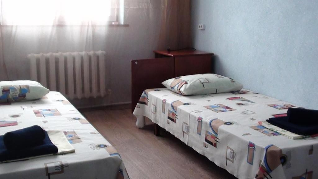 Двухместный (Бюджетный двухместный номер с 2 отдельными кроватями) гостиницы Солнце, Тюмень