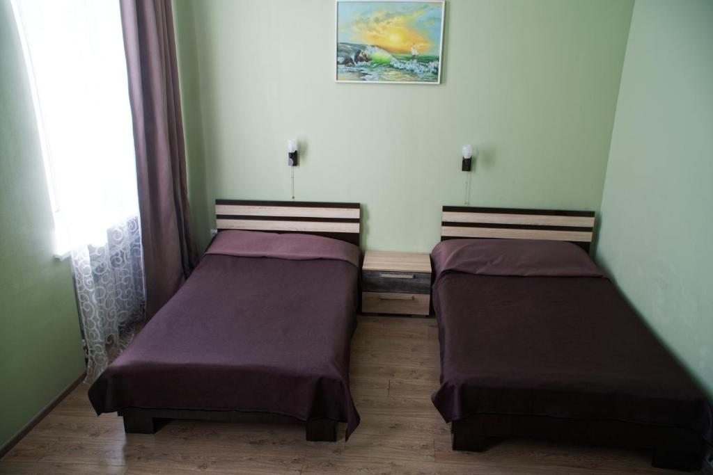 Двухместный (Двухместный номер Делюкс с 2 отдельными кроватями) отеля Альфа, Магнитогорск