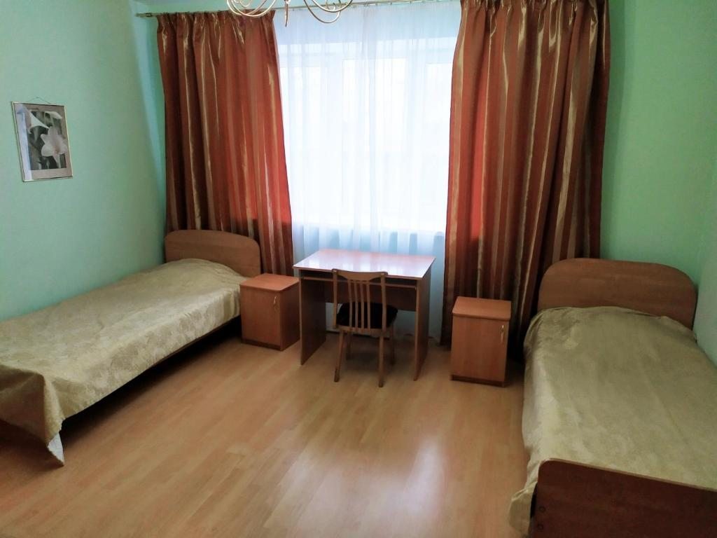 Двухместный (Двухместный номер с 2 отдельными кроватями и собственной ванной комнатой) гостевого дома Северная Ночь, Петрозаводск