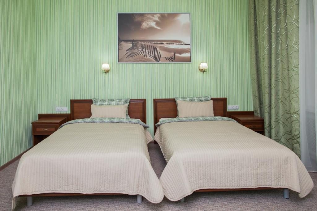 Двухместный (Двухместный номер с 2 отдельными кроватями и балконом) отеля Оливия, Липецк
