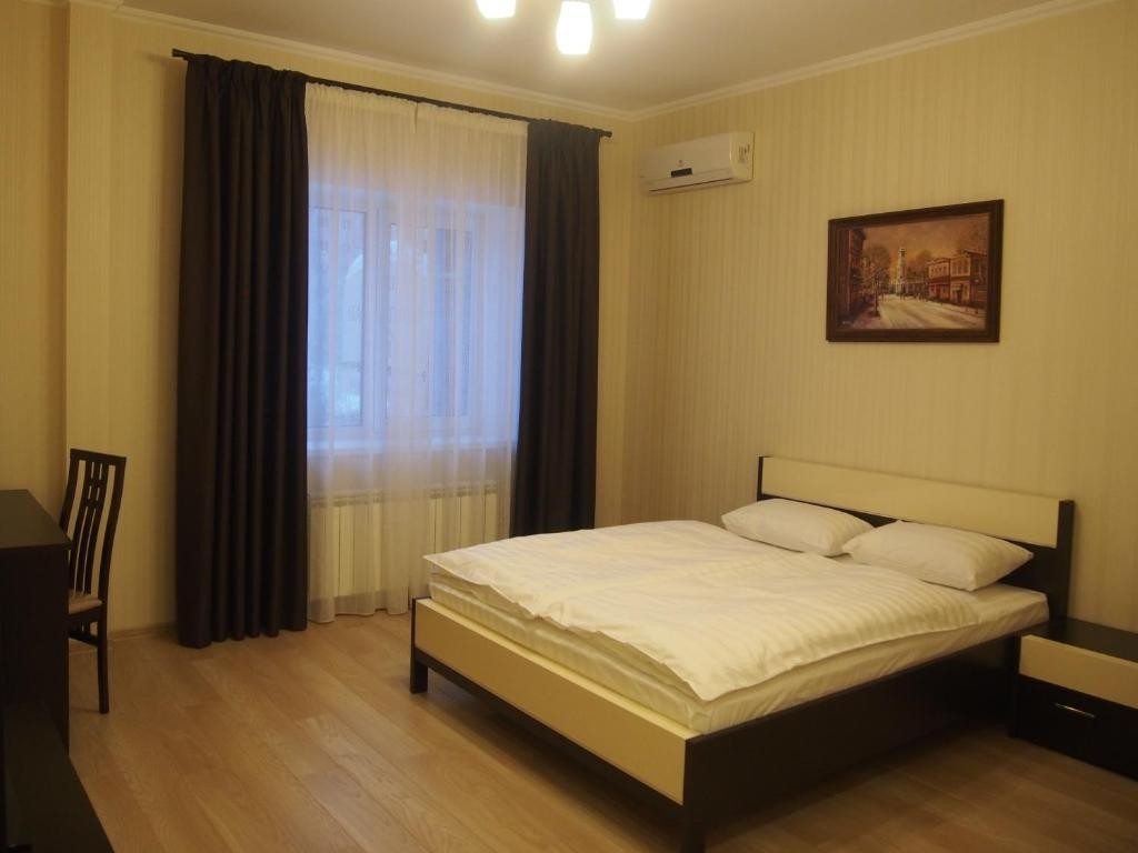 Двухместный (Двухместный номер Делюкс с 1 кроватью и ванной) мини-отеля на Цветном, Тольятти