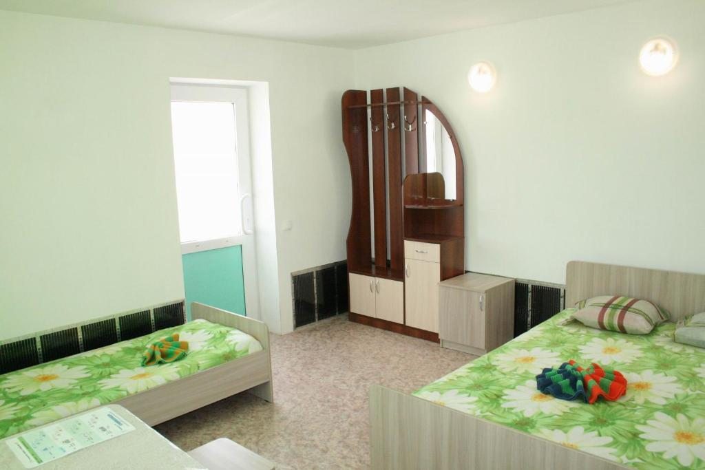 Двухместный (Бюджетный двухместный номер с 2 отдельными кроватями) гостевого дома Усадьба Радана, Хужир