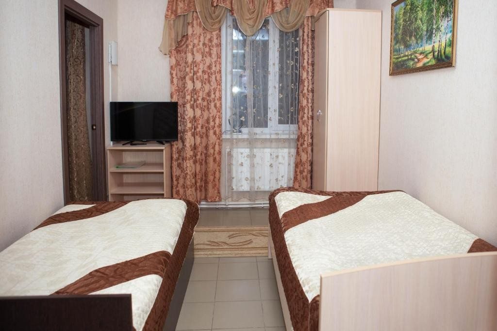 Двухместный (Двухместный номер с 2 отдельными кроватями и ванной комнатой) отеля Виктория, Саранск