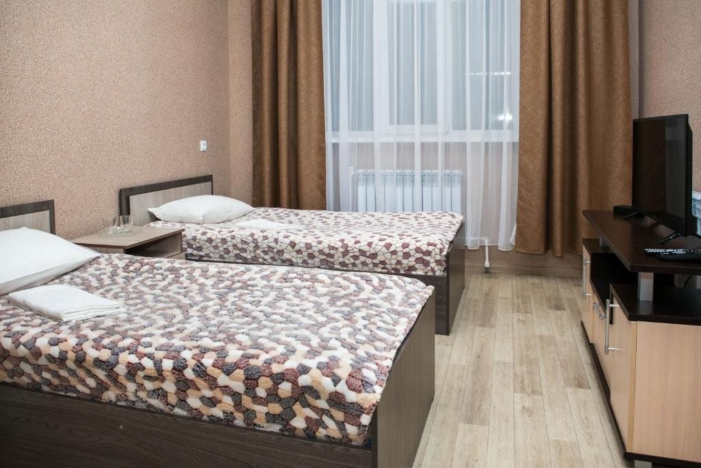 Номер (Односпальная кровать в общем номере) отеля Виктория, Саранск