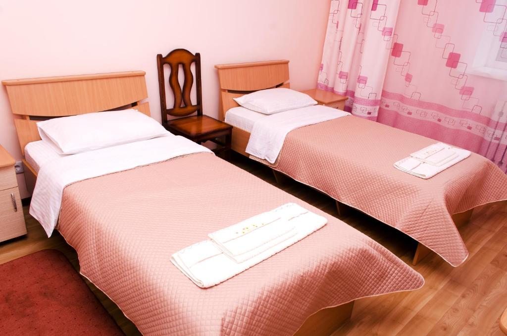 Номер (Односпальная кровать в общем номере для мужчин и женщин) отеля Ташир, Рубцовск