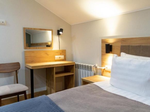 Фотография номера гостиницы Гестен