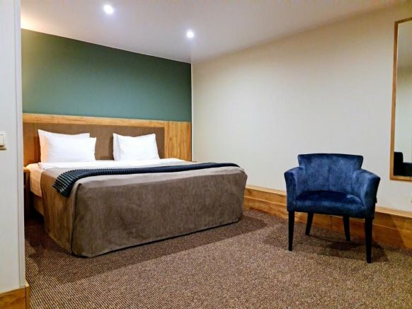 Фотография номера гостиницы Гестен