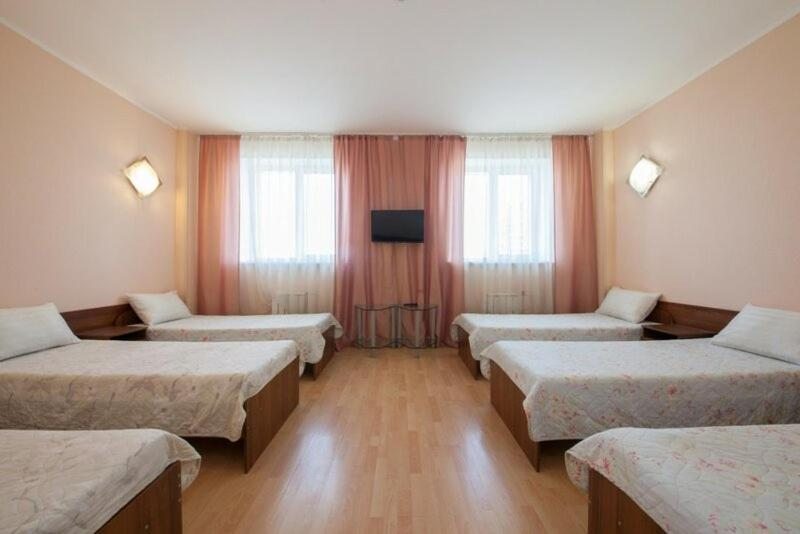 Номер (Односпальная кровать в общем номере с 6 кроватями) гостиницы Северная звезда, Красноярск