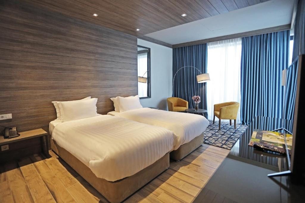 Двухместный (Номер «Премьер» с 2 отдельными кроватями (новое здание)) отеля Ambassadori Kachreti Golf Resort, Качрети