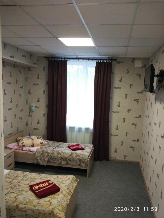 Двухместный (Стандартный двухместный номер с 2 отдельными кроватями) гостиницы Тёплый Стан, Бокситогорск