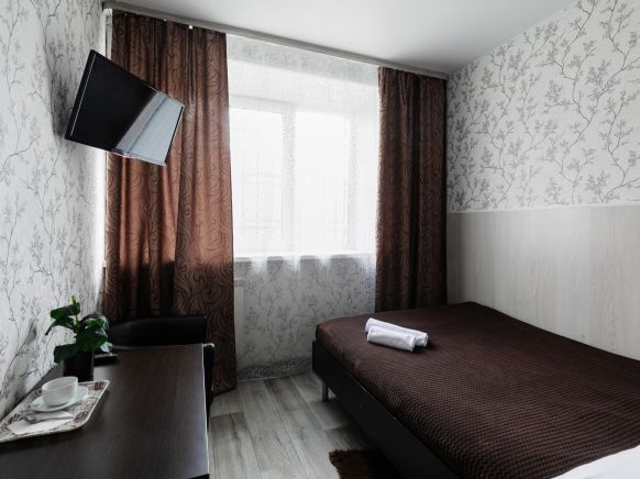 Фотография номера мини отеля Миллениум в центре