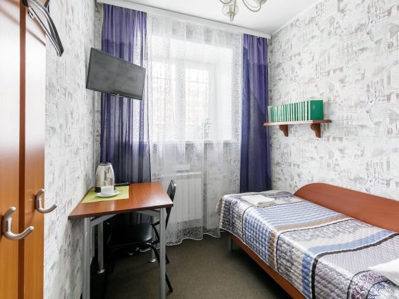 Фотография номера мини отеля Миллениум в центре