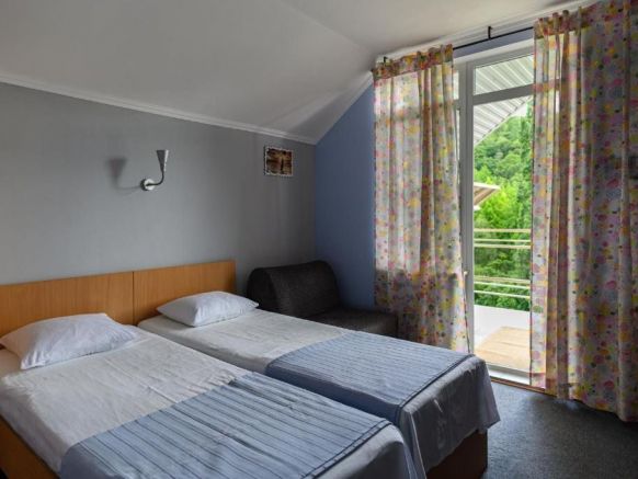 Фотография номера гостевого дома Желтый Дом