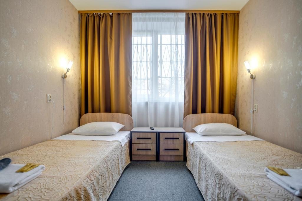 Двухместный (Бюджетный двухместный номер с 2 отдельными кроватями) отеля Ладомир на Щёлковской, Москва