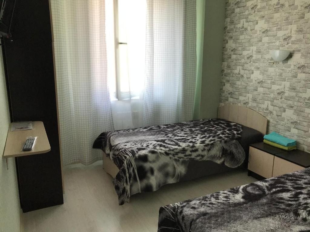 Двухместный (Двухместный номер с 2 отдельными кроватями и ванной комнатой) отеля Тирас, Москва